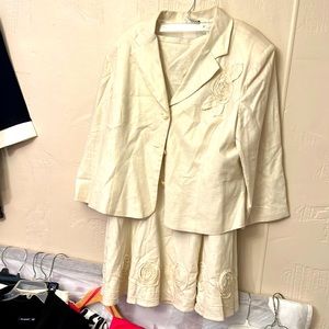 Cream color, two-piece suit with jacket and skirt, florettes has light shimmer